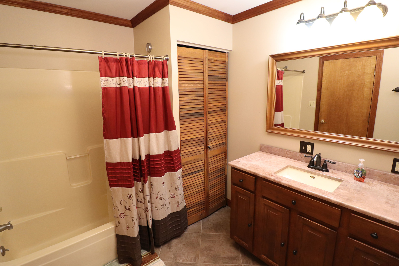 8792 Texas Church Road Clinton, IL 61727 - Photo 18 of 29 a bathroom with a sink and a mirror