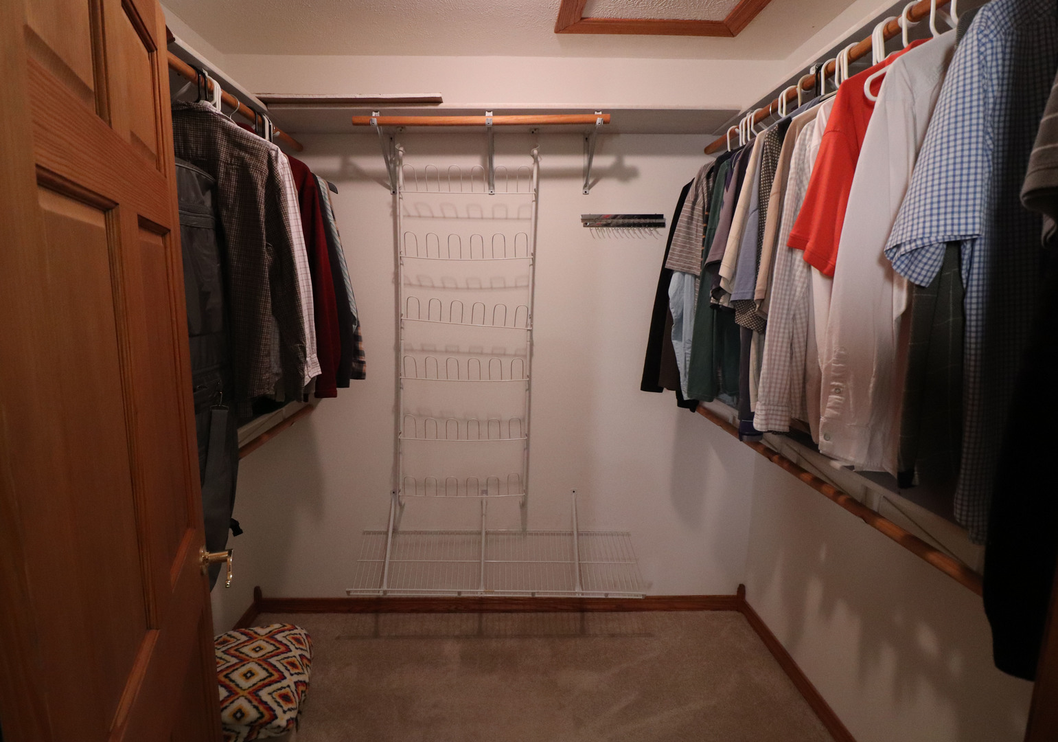 8792 Texas Church Road Clinton, IL 61727 - Photo 20 of 29 a view of walk in closet with clothes