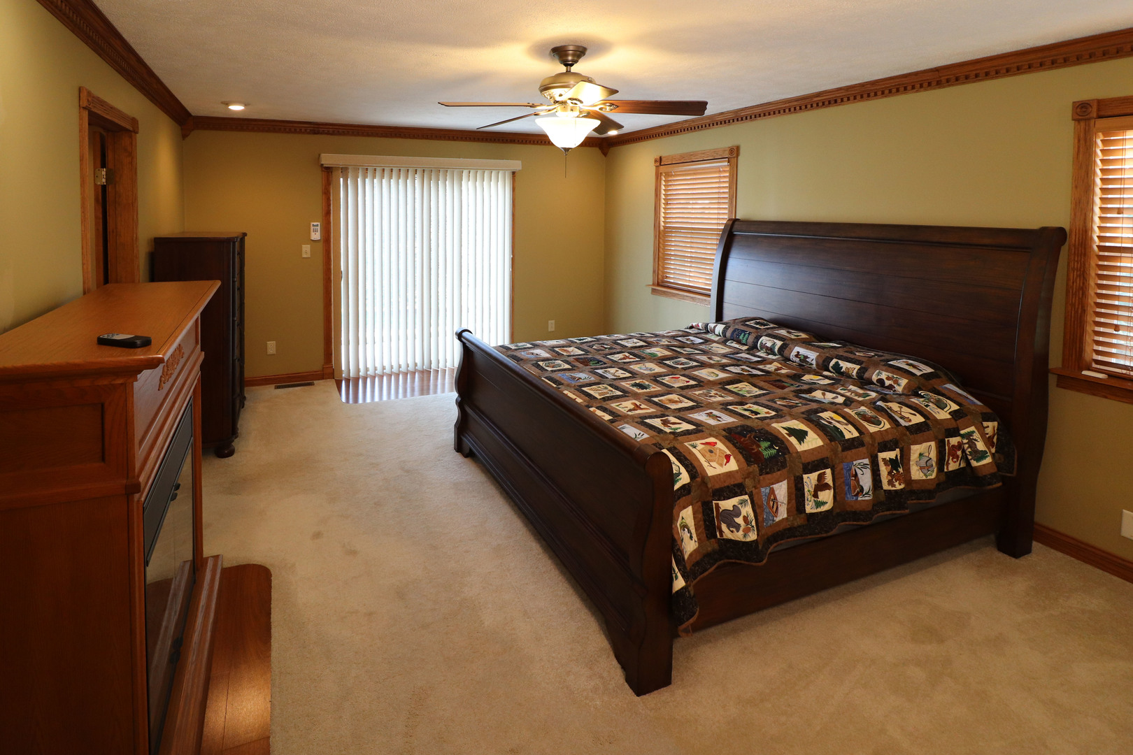 8792 Texas Church Road Clinton, IL 61727 - Photo 21 of 29 a bedroom with a bed dresser and a window