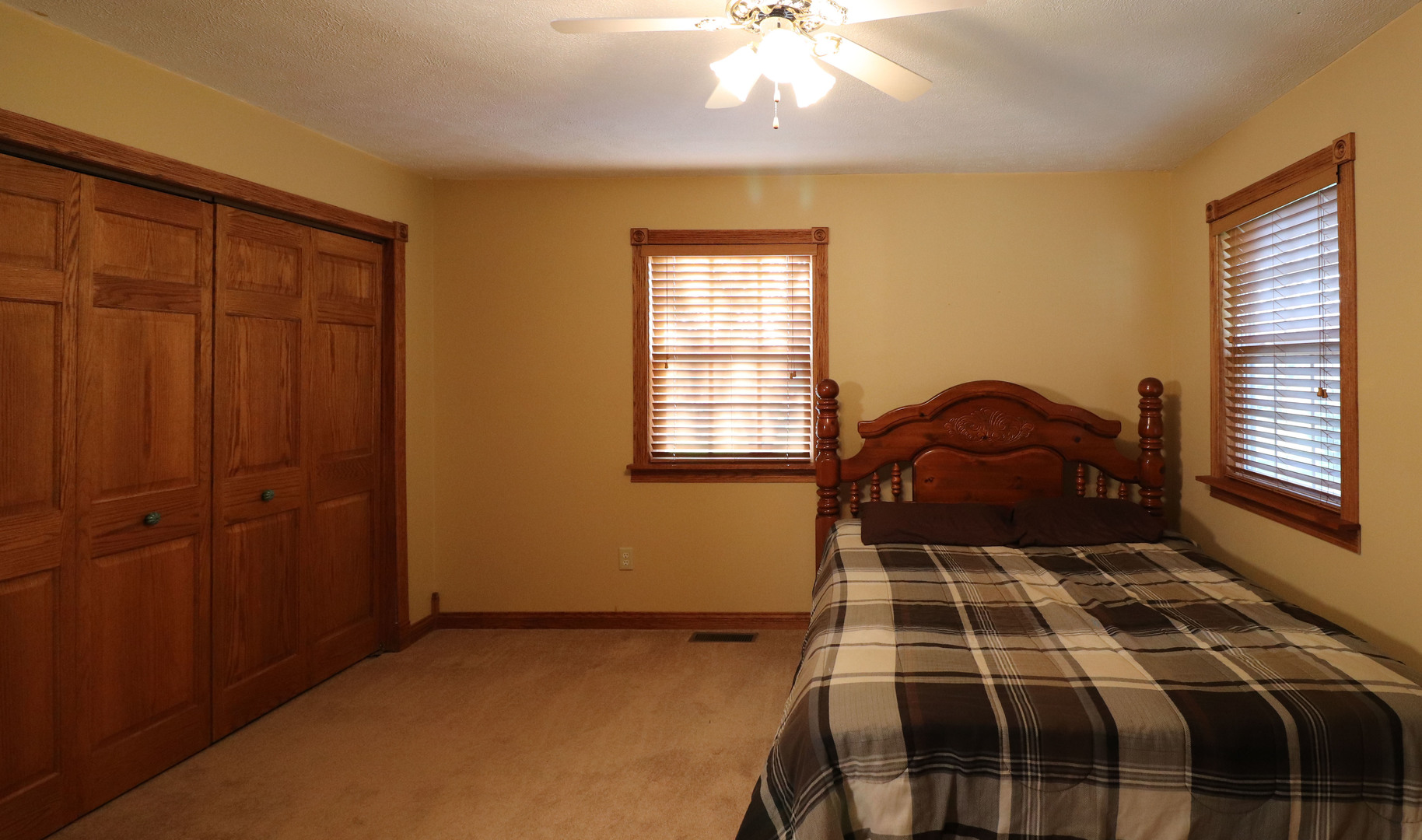 8792 Texas Church Road Clinton, IL 61727 - Photo 24 of 29 a bedroom with a bed and a window
