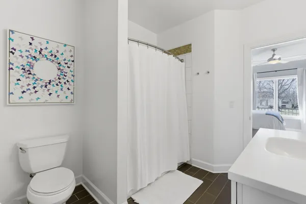 a bathroom with a sink and toilet