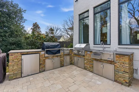 a kitchen with a sink and a stove