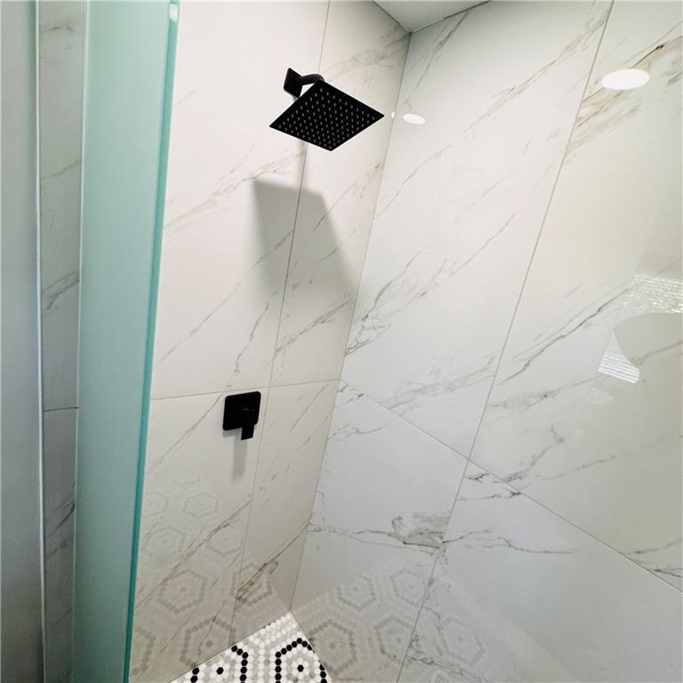 2054 Fargo Place Southeast Atlanta, GA 30316 - Photo 18 of 23 a bathroom with a shower