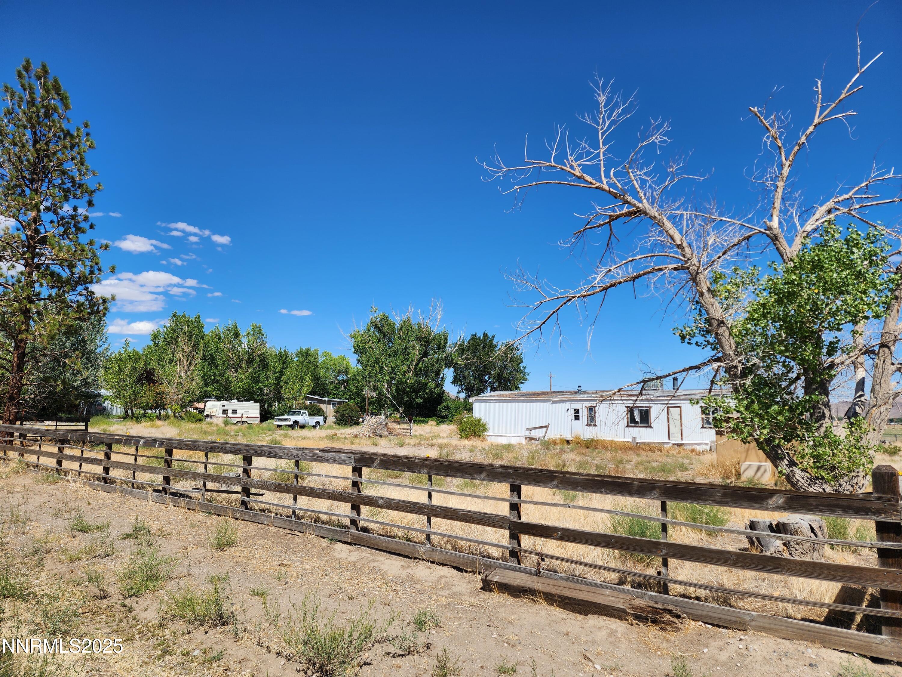 526 Sutro Springs Road Dayton, NV 89403 - Photo 2 of 14 a view of a yard with a tree