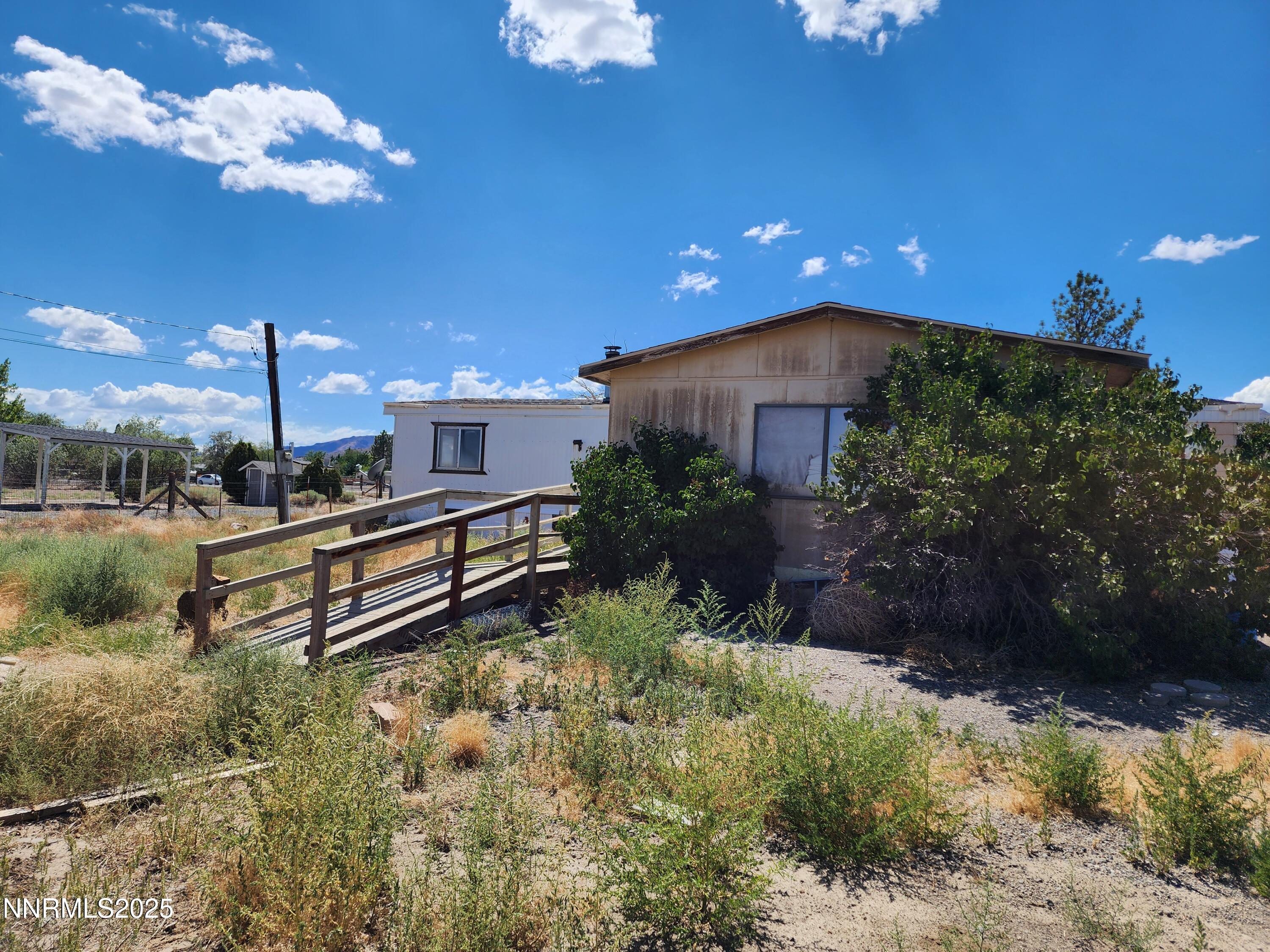 526 Sutro Springs Road Dayton, NV 89403 - Photo 5 of 14 a view of a house with a yard