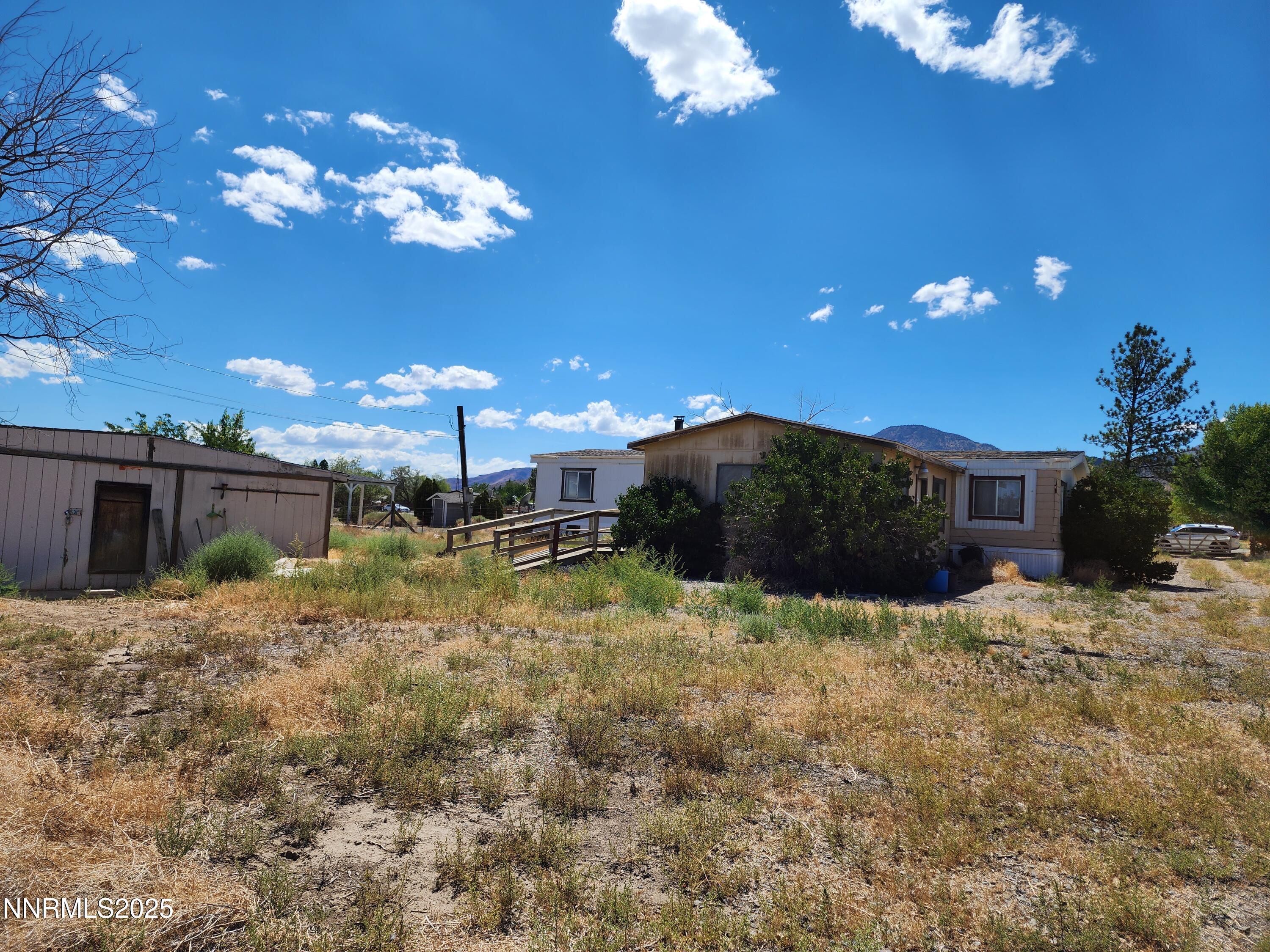 526 Sutro Springs Road Dayton, NV 89403 - Photo 9 of 14 a view of a house with a yard