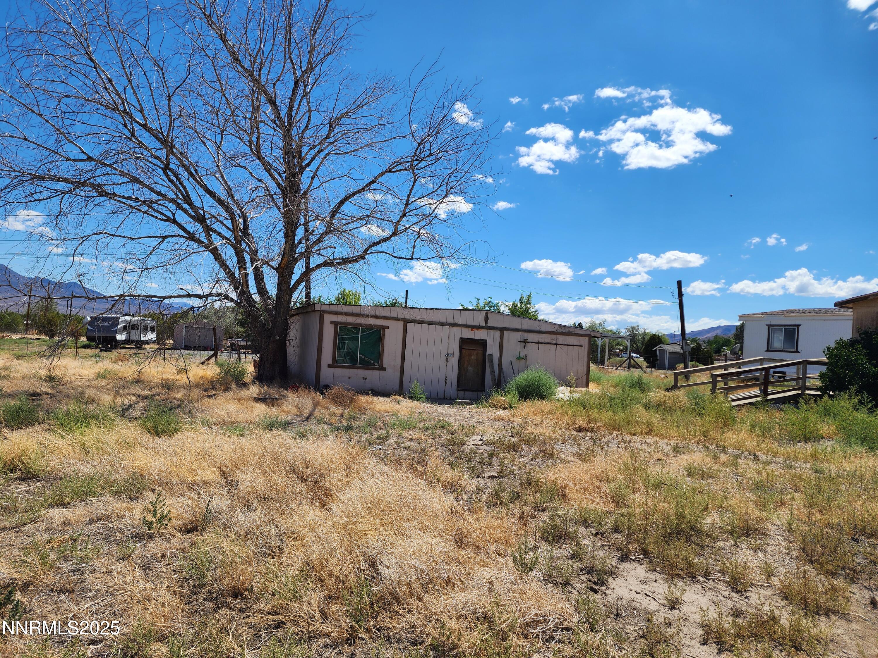 526 Sutro Springs Road Dayton, NV 89403 - Photo 10 of 14 a view of a house with a snow in a yard