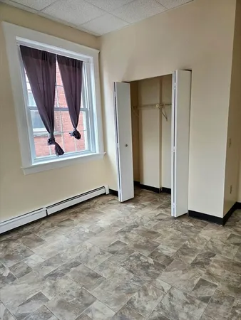 an empty room with window