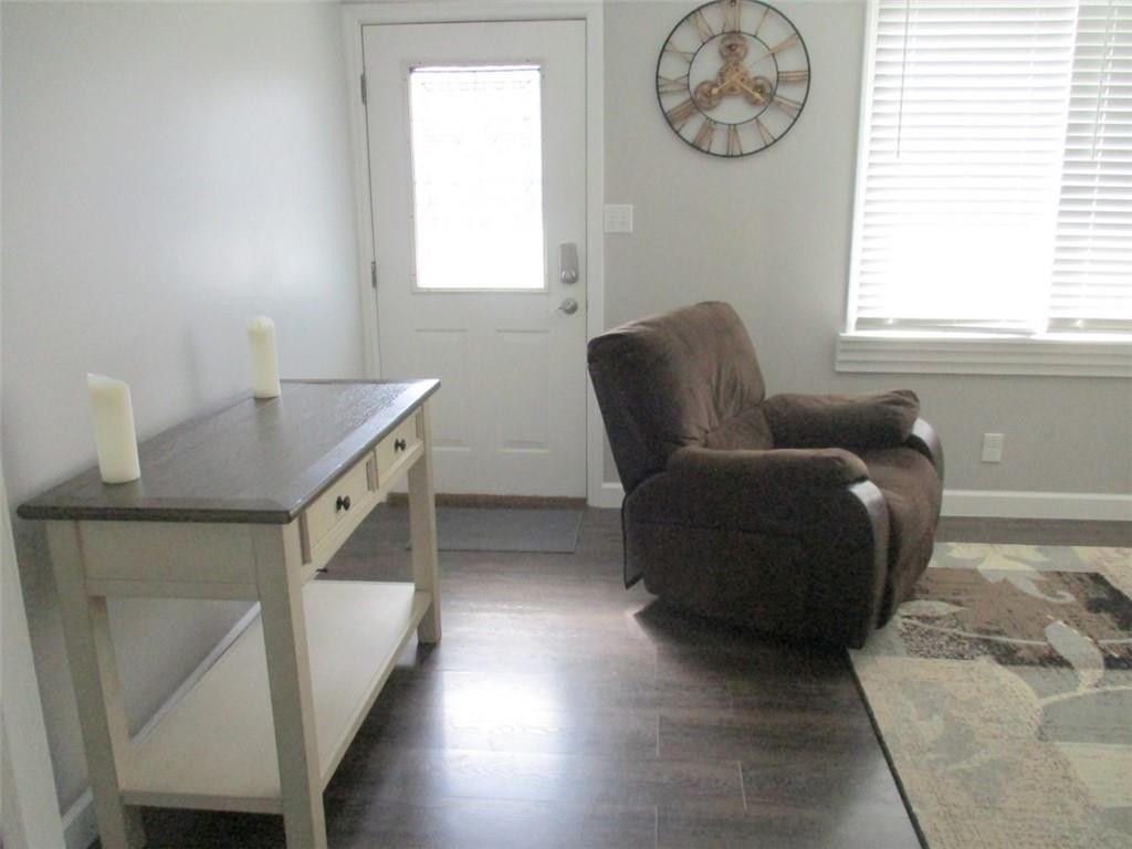 24 Russell Street Baden, PA 15005 - Photo 11 of 31 a living room with furniture and a window