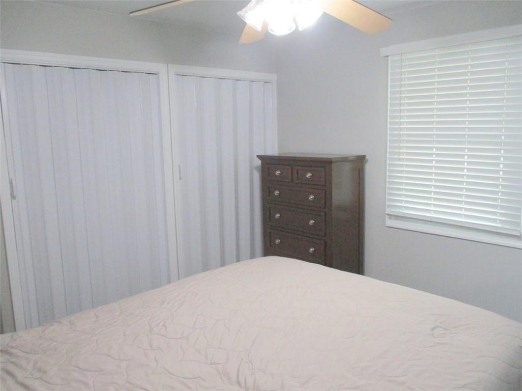 24 Russell Street Baden, PA 15005 - Photo 21 of 31 a bedroom with a bed and a window