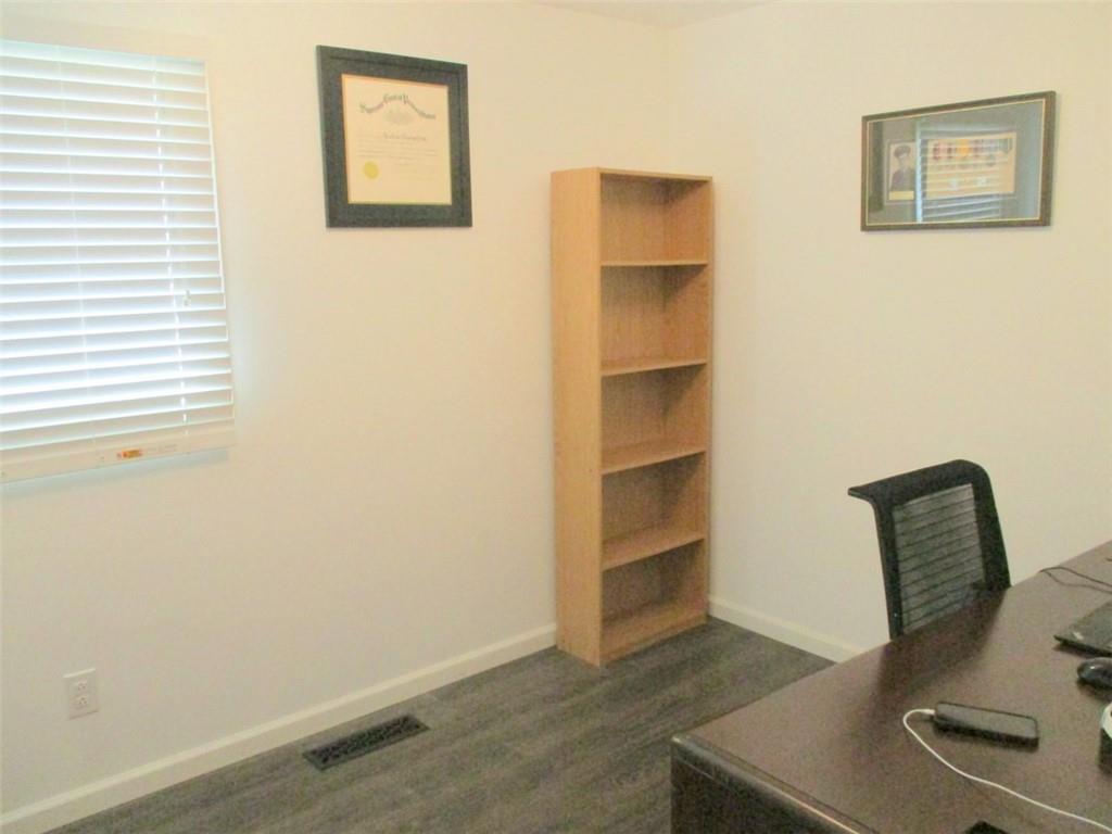 24 Russell Street Baden, PA 15005 - Photo 23 of 31 a view of workspace with wooden floor