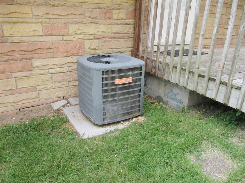 24 Russell Street Baden, PA 15005 - Photo 9 of 31 a view of a backyard with a chair