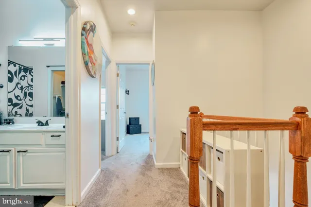 a utility room with a sink dryer and washer