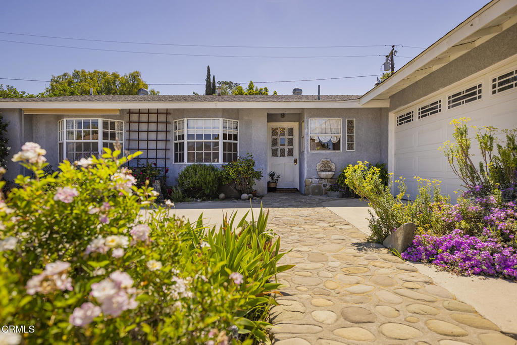 40 Almond Avenue Oak View, CA 93022 - Photo 2 of 30 a front view of a house with a yard