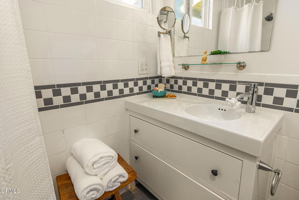 40 Almond Avenue Oak View, CA 93022 - Photo 24 of 30 a bathroom with a sink and a mirror
