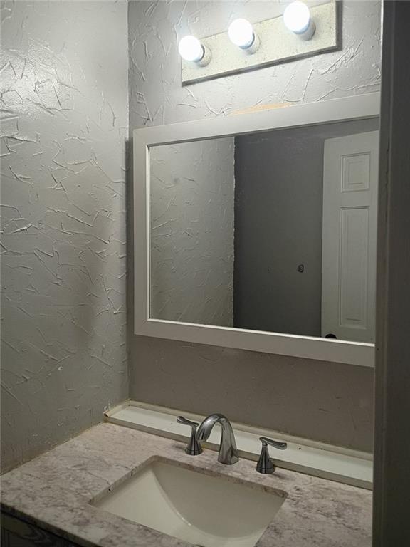 7130 Nantz Road Winston, GA 30187 - Photo 11 of 24 a bathroom with a sink and vanity