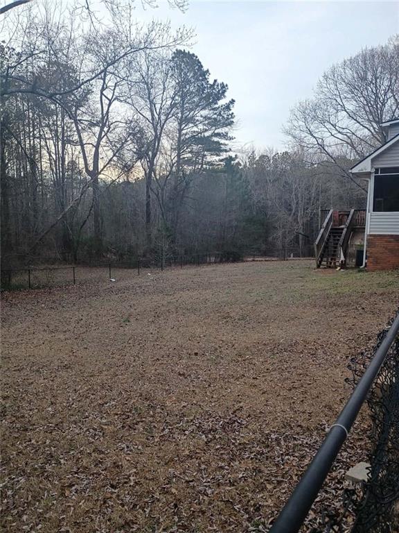 7130 Nantz Road Winston, GA 30187 - Photo 23 of 24 a backyard of a house