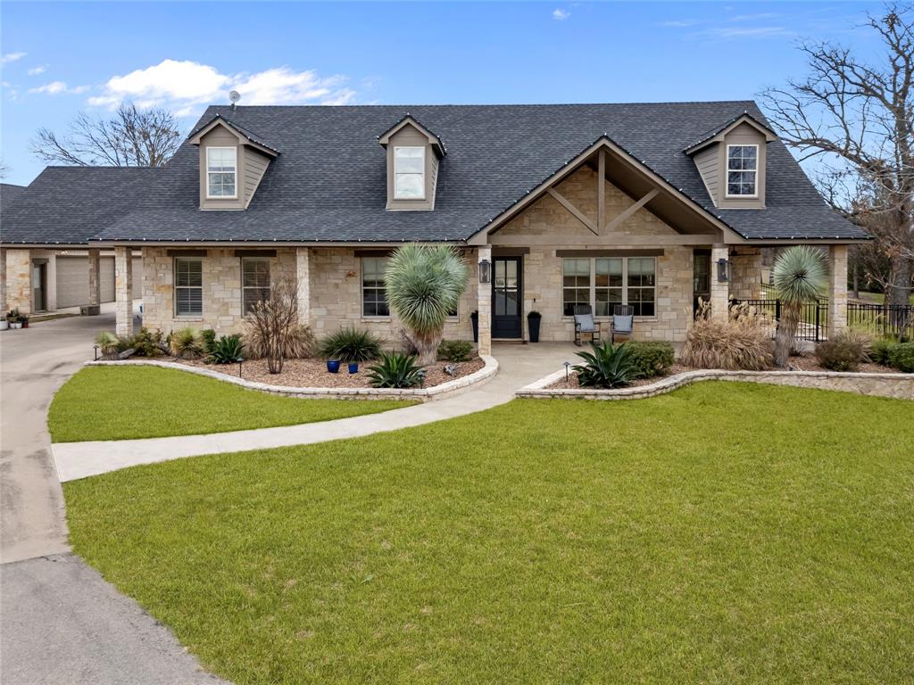 4255 Annetta Centerpoint Road Aledo, TX 76008 - Photo 1 of 1 a front view of a house with garden and patio