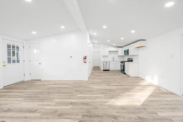 a view of kitchen and a window