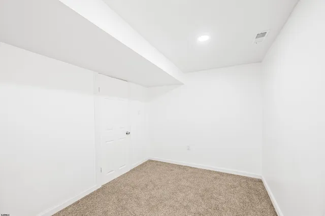 a bathroom with a sink a mirror and a bathtub