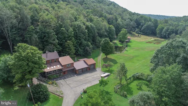 a backyard of a house with lots of green space