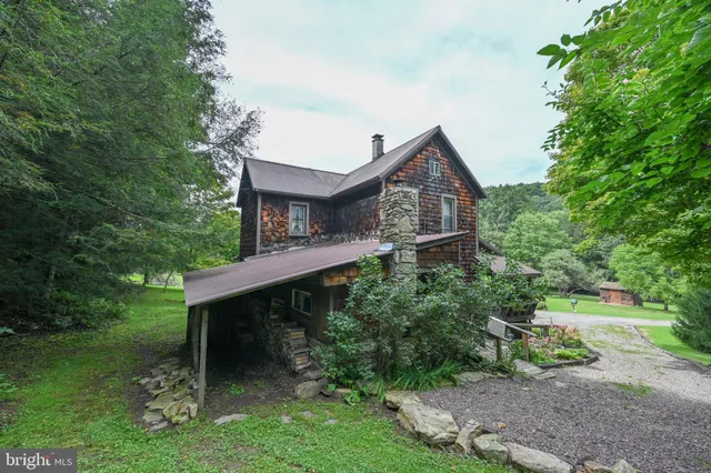 a view of a garden with a lake view