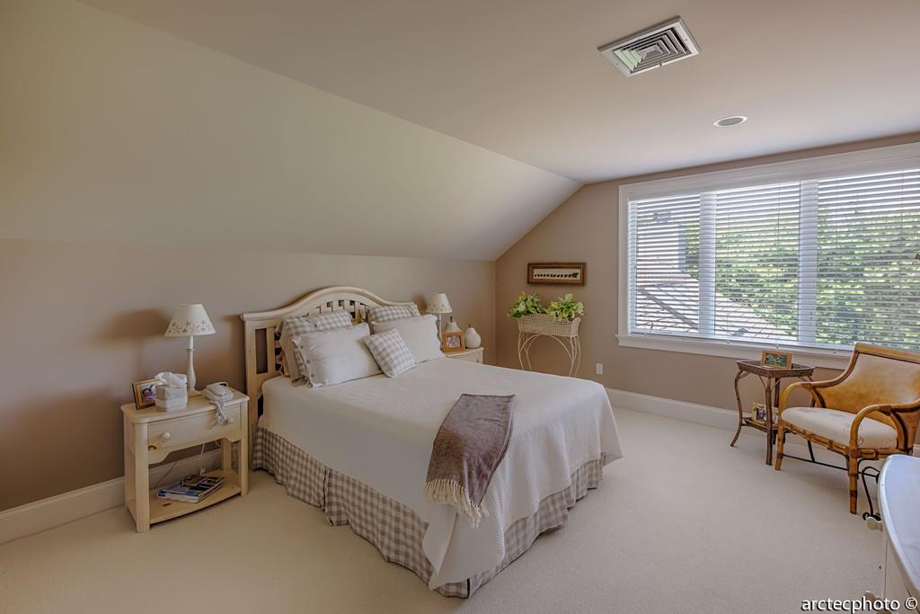 56 The Heights Mashpee, MA 02649 - Photo 12 of 16 a bedroom with a bed and a couch