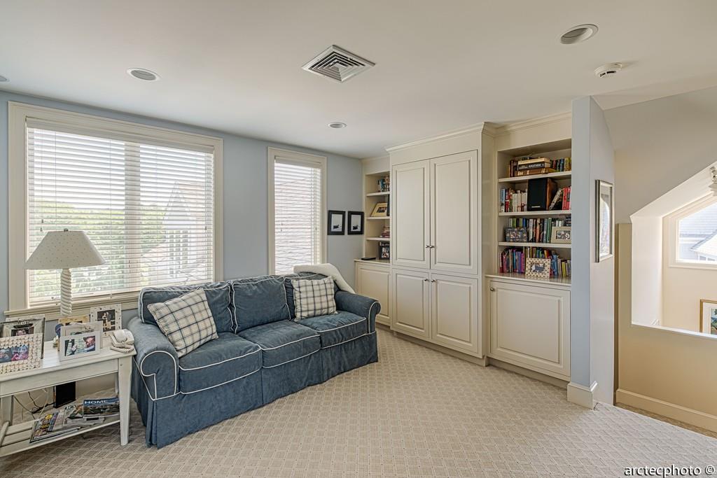 56 The Heights Mashpee, MA 02649 - Photo 14 of 16 a living room with furniture and large window