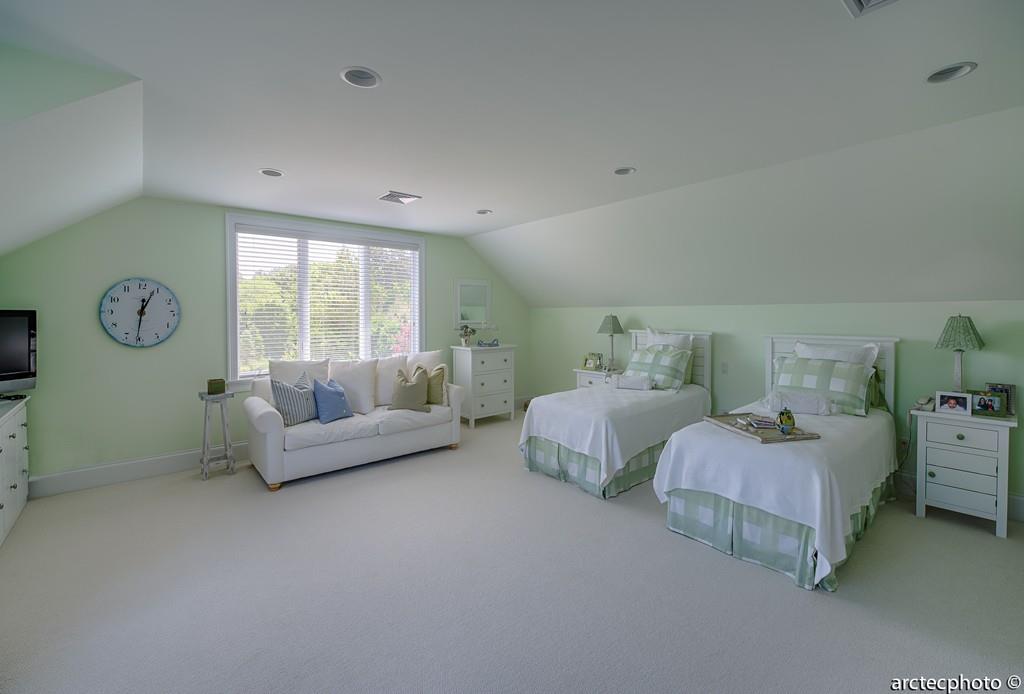 56 The Heights Mashpee, MA 02649 - Photo 15 of 16 a spacious bedroom with two beds and a large window