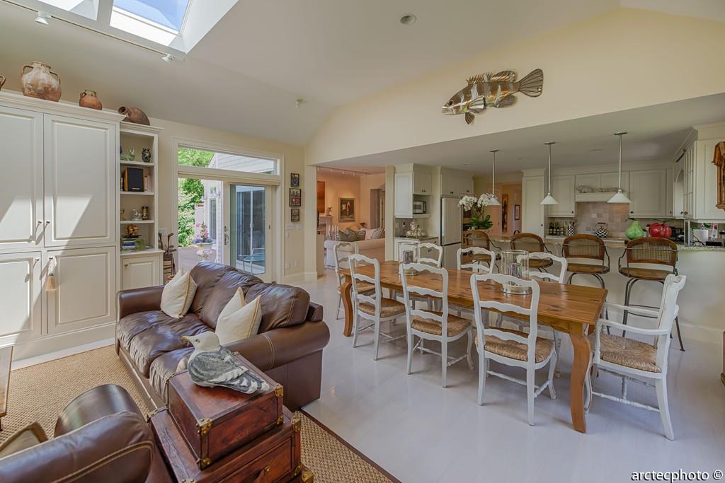 56 The Heights Mashpee, MA 02649 - Photo 8 of 16 a living room with furniture a lamp and windows