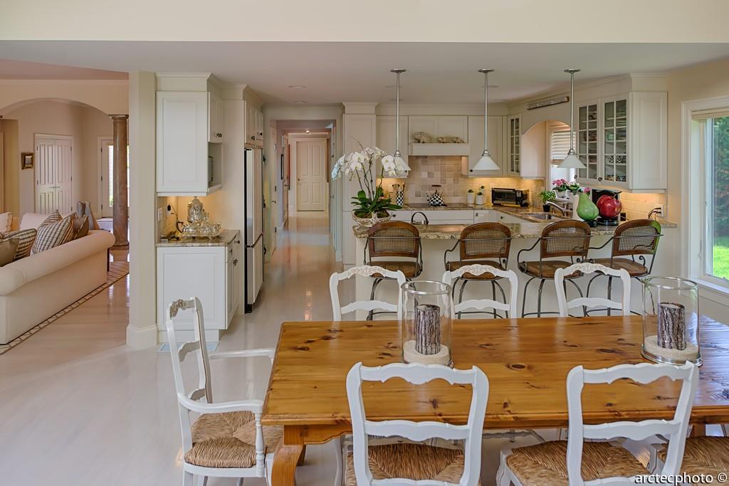 56 The Heights Mashpee, MA 02649 - Photo 9 of 16 a living room with lots of furniture and view of kitchen