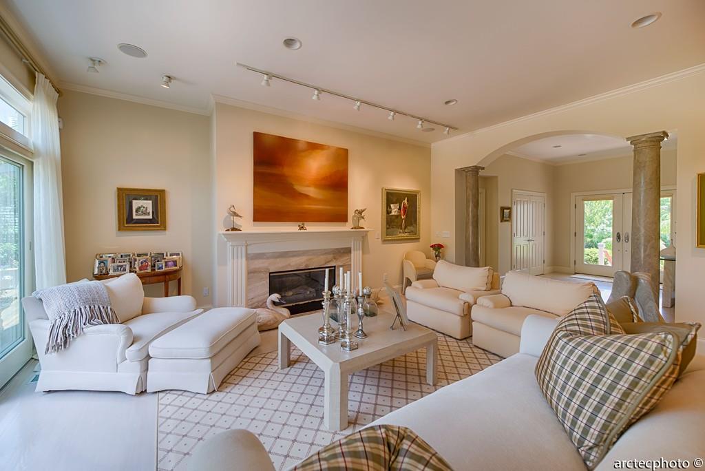 56 The Heights Mashpee, MA 02649 - Photo 10 of 16 a living room with furniture fireplace and a flat screen tv