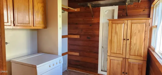 a bathroom with a toilet sink and a shower