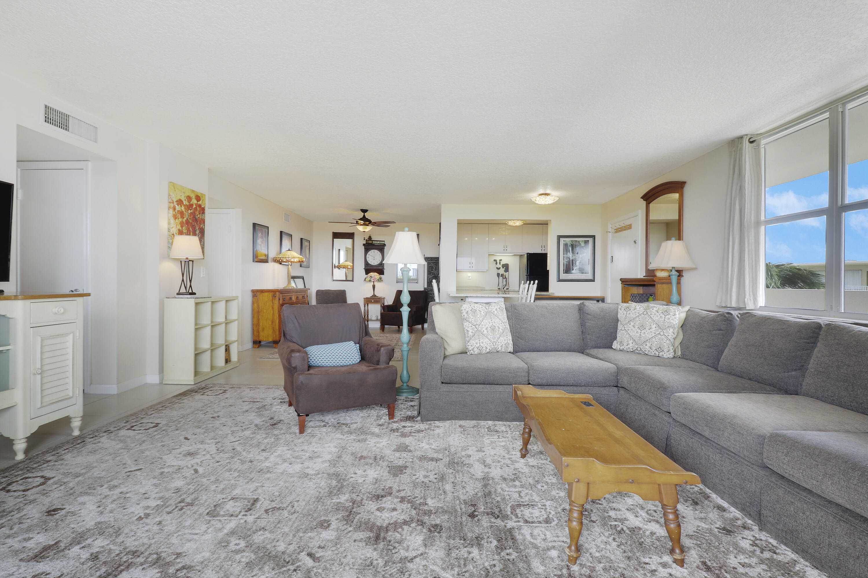 3640 North Ocean Drive, Unit 427 Singer Island, FL 33404 - Photo 15 of 43 a living room with furniture and a couch