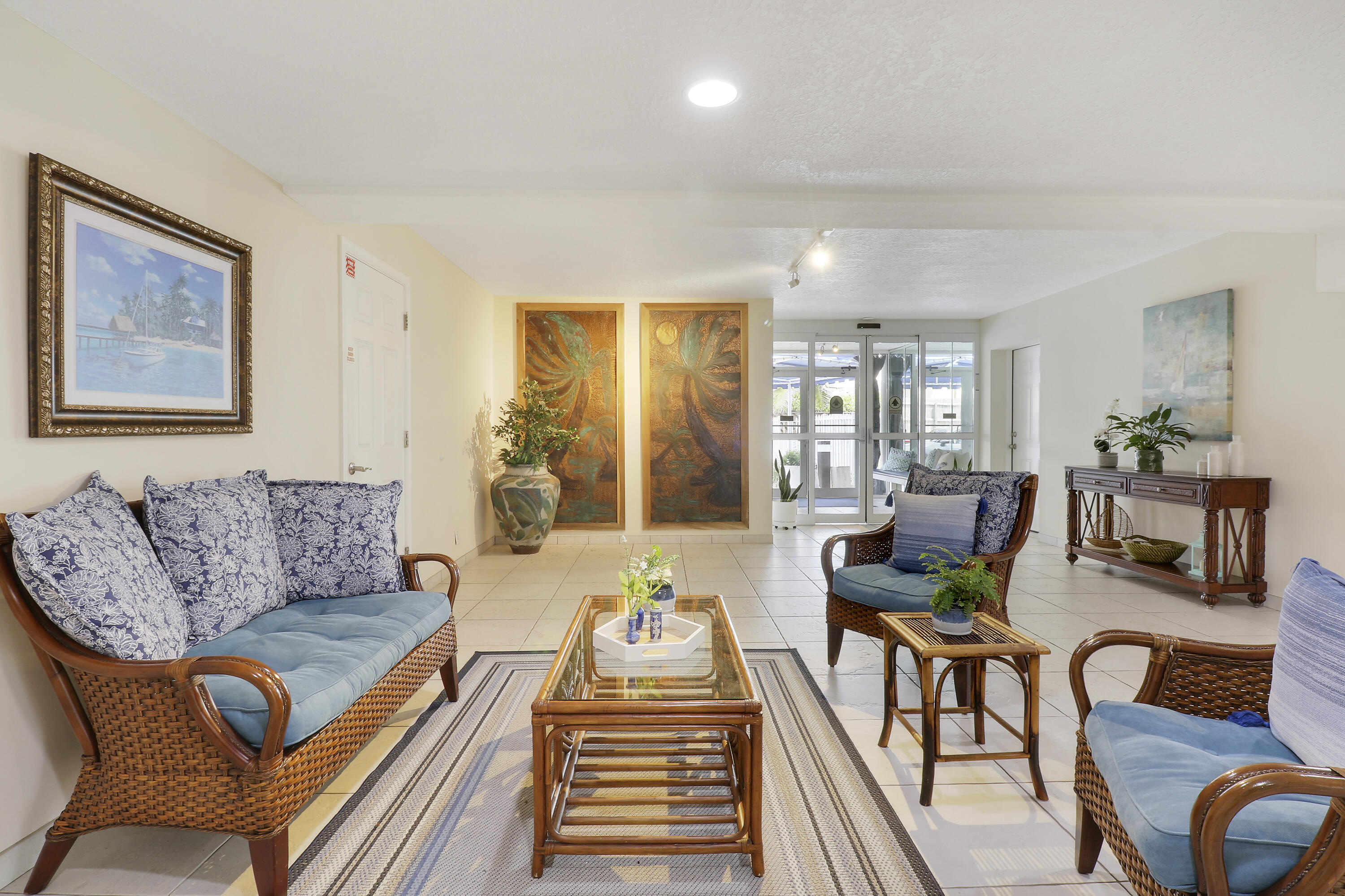 3640 North Ocean Drive, Unit 427 Singer Island, FL 33404 - Photo 4 of 43 a living room with furniture and wooden floor