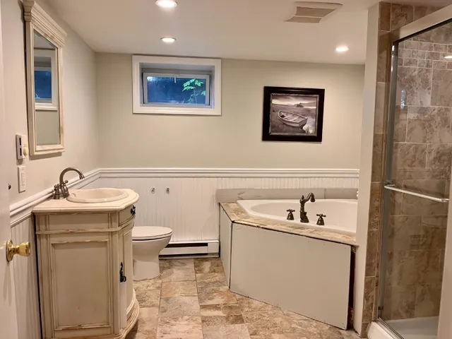 a bathroom with a sink and a toilet