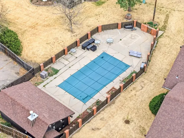 a view of a swimming pool with a lake