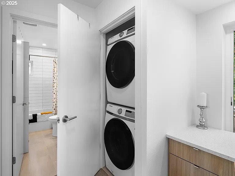 3590 Southwest Patton Road, Unit C Portland, OR 97221 - Photo 20 of 40 a close view of a utility room with dryer and washer