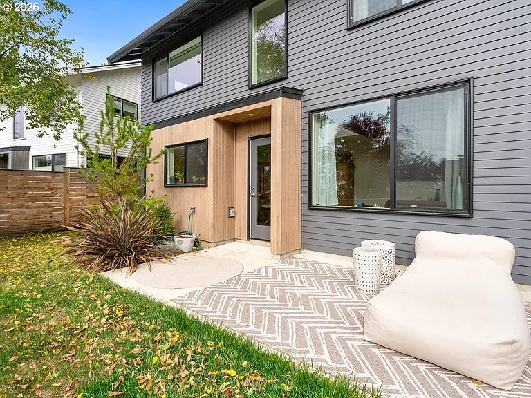 3590 Southwest Patton Road, Unit C Portland, OR 97221 - Photo 23 of 40 a view of a house with a patio