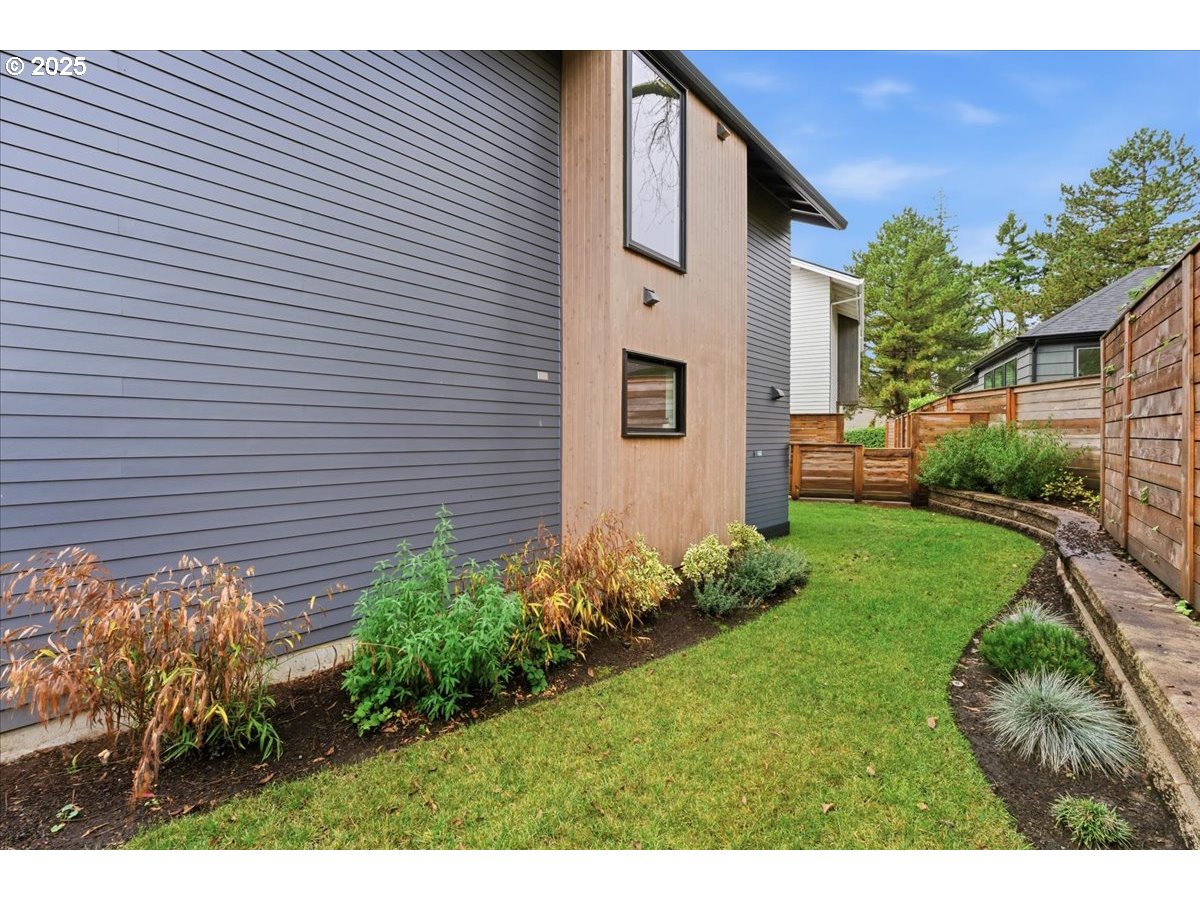 3590 Southwest Patton Road, Unit C Portland, OR 97221 - Photo 27 of 40 a view front of house with backyard and trees