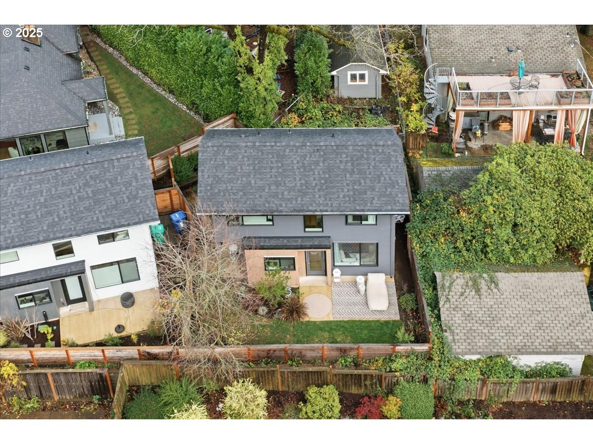 3590 Southwest Patton Road, Unit C Portland, OR 97221 - Photo 31 of 40 aerial view of a house with a yard and plants