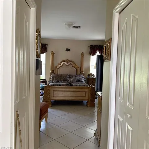 a room with a door and furniture