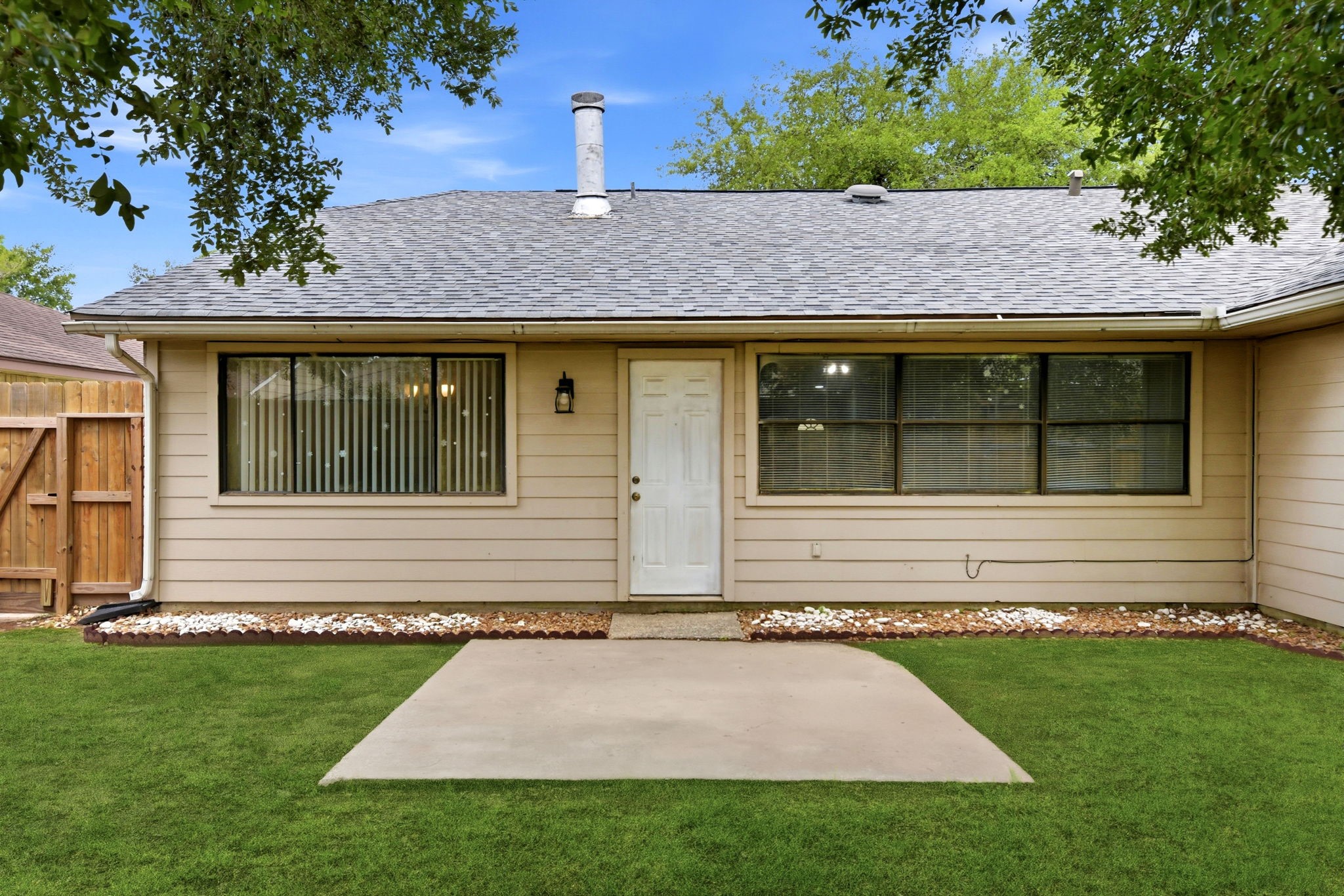 21330 Golden Dove Drive Spring, TX 77388 - Photo 29 of 29 Easy access from the kitchen right out to the concrete patio makes indoor/outdoor entertaining an absolute breeze. Schedule your showing today!