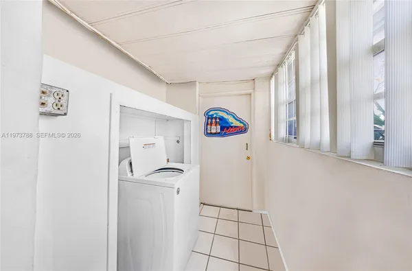 a view of hallway with furniture and toys