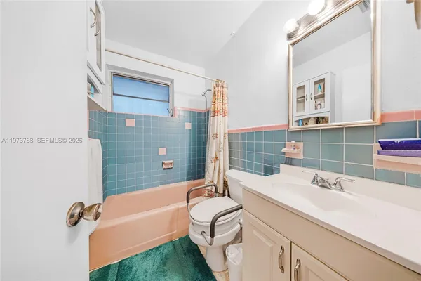 a bathroom with a sink and a bathtub