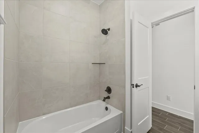 a bathroom with a bathtub