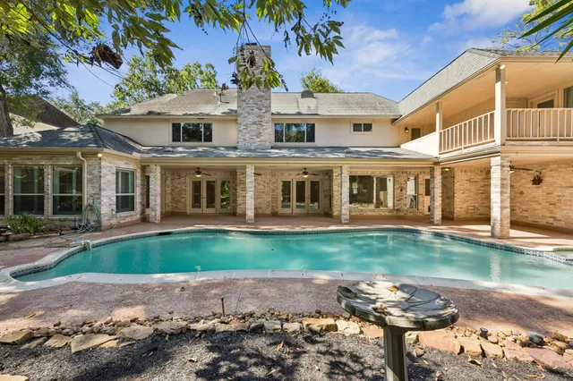 front view of a house with a garden