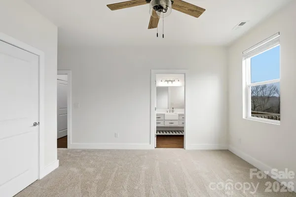 a view of livingroom with washer and dryer