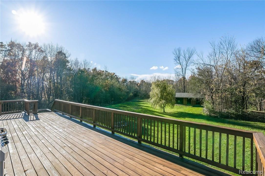 277 North Baldwin Road Oxford, MI 48371 - Photo 36 of 45 WRAP-AROUND DECK - FACING WEST FOR SUNSET VIEWS!