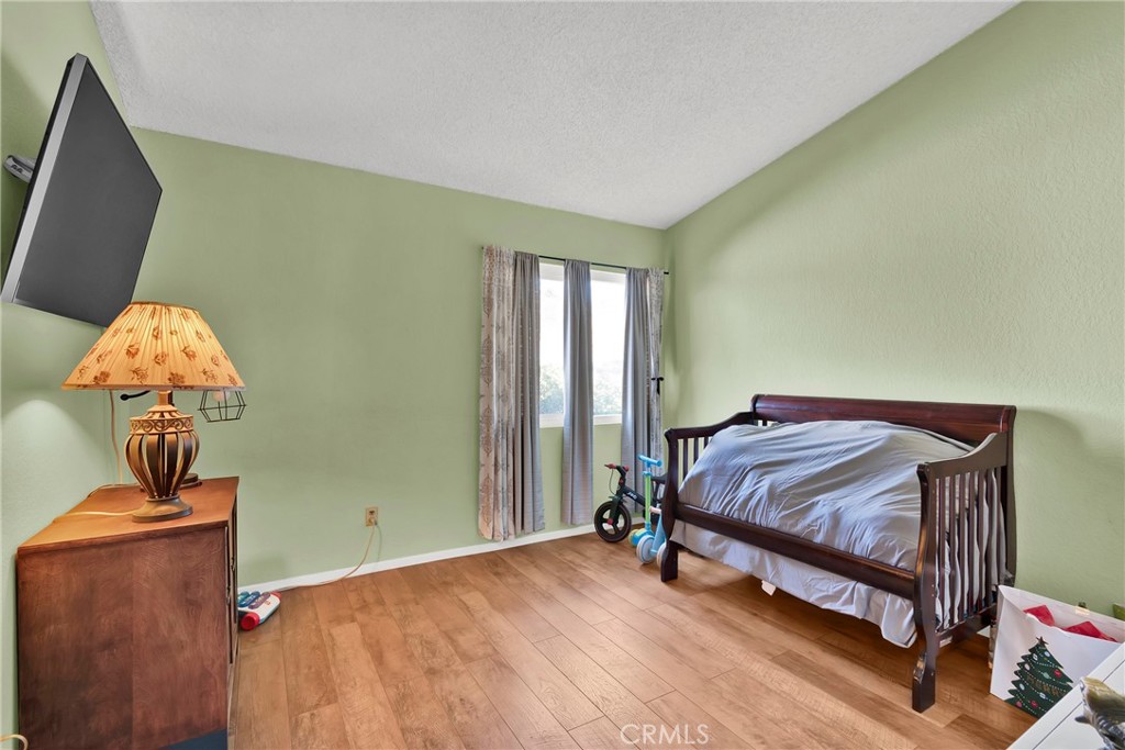 3350 May Court Riverside, CA 92503 - Photo 17 of 55 a bedroom with a bed and window